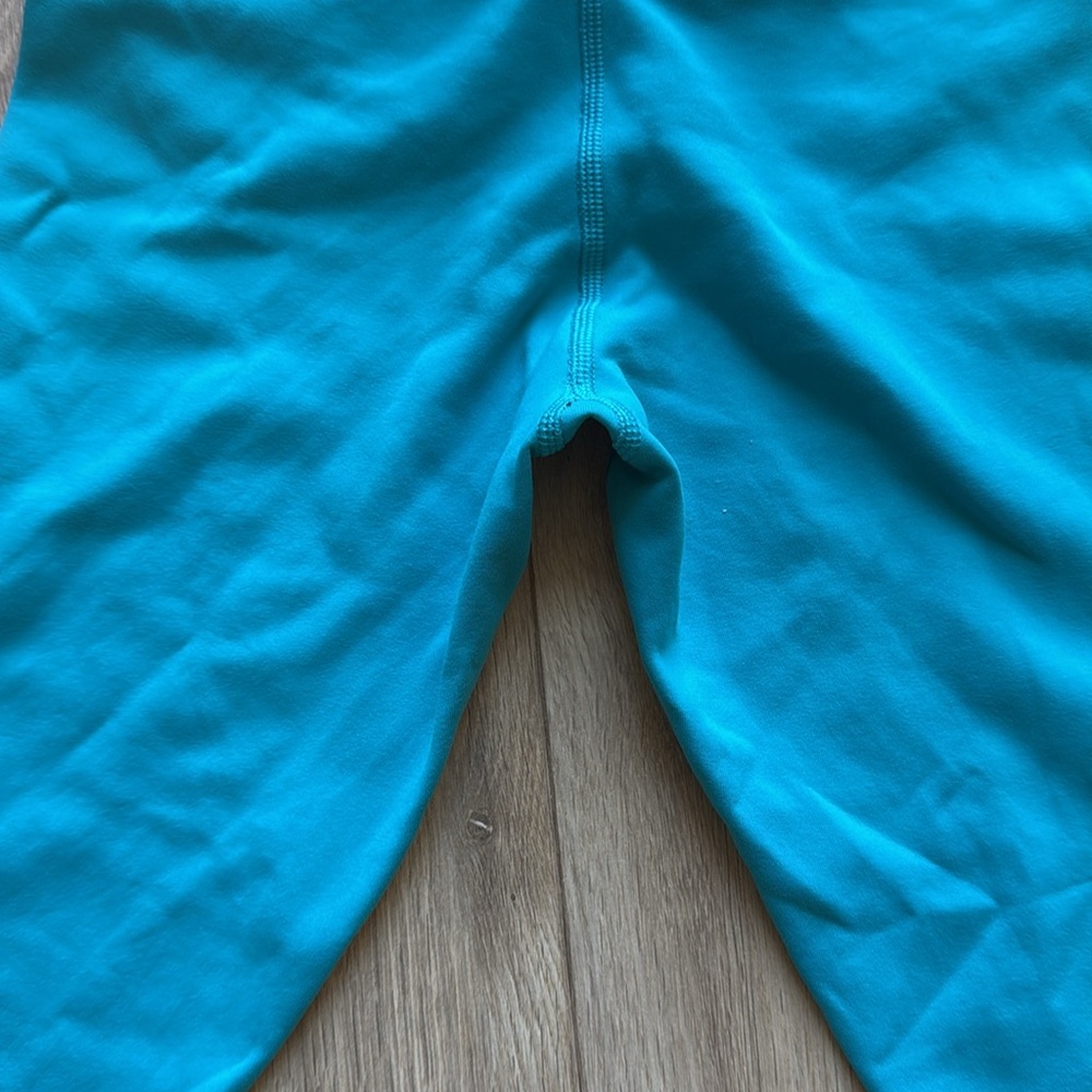 LULULEMON Bright Blue Teal & Navy Reversible Workout Cropped Leggings - Picture 2 of 7